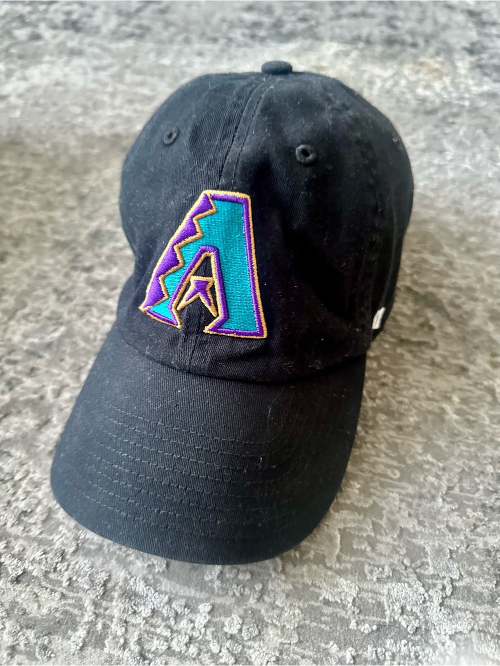Black Baseball Cap with Teal & Purple 'A' Patch